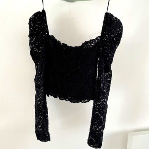 Really cute, sexy lace black crop top w/ long sleeves with slight puff shoulder